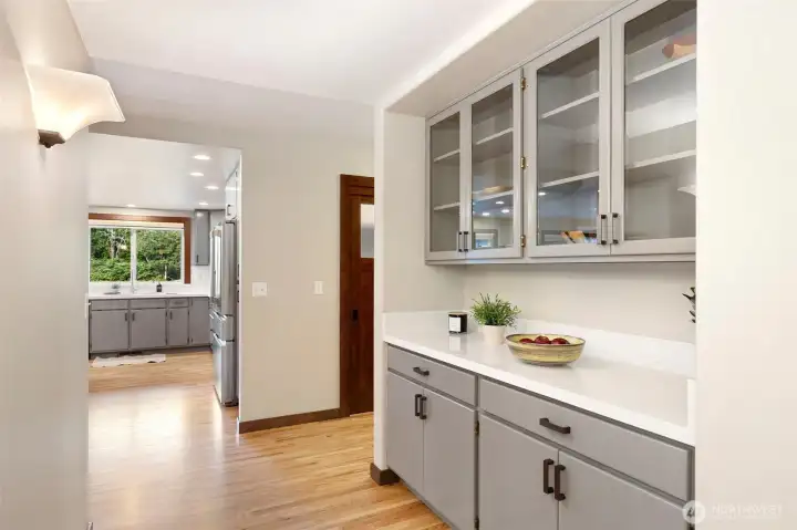 Halway from Dining to Kitchen with built in Buffet