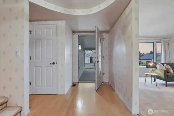 foyer, hardwood floors, carpeted living room foyer, hardwood floors, carpeted living room