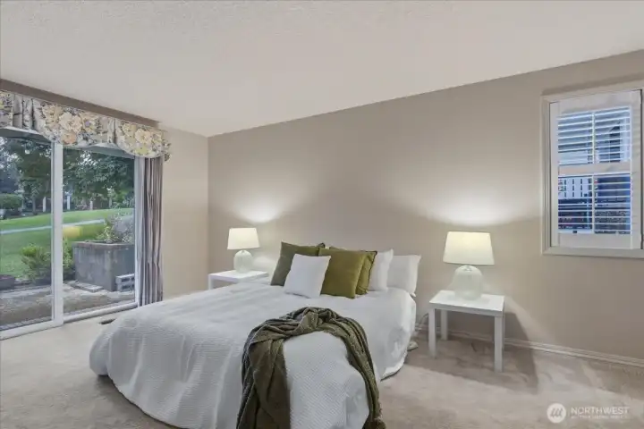 primary bedroom, patio access, carpeted, owner's suite primary bedroom, patio access, carpeted, owner's suite