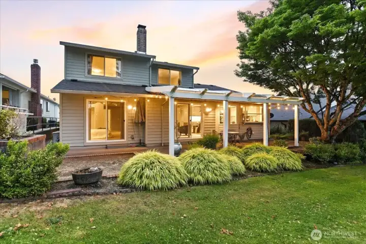 rear of home, patio, landscaping, low-maintenance, golf course view rear of home, patio, landscaping, low-maintenance, golf course view