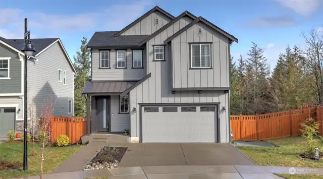 Step into luxury living in the coveted Tehaleh community! This stunning 6 bed/5 bath home boasts over $70k in upgrades, ensuring comfort & style at every turn. Spanning 3 stories, this gem features a basement w/a versatile bonus rm & guest suite, plus slider to patio & backyard. Main floor has living rm, kitchen w/eating space, bedroom w/a convenient 3/4 guest bath & XL covered deck. Ascend upstairs & find a cozy bonus nook, along w/the primary suite, complete w/a lavish W/I closet & 5-piece en suite. Two addt'l beds & two full guest baths upstairs provide space for everyone. Situated on almost a quarter-acre lot, relish in the serenity of backing to a lush greenbelt. Don't miss the opportunity to call this extraordinary residence your own!