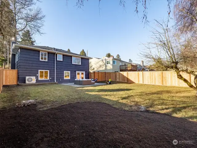 Expansive backyard awaits your touch. Space for garden, playset, sheshed or even build a DADU!