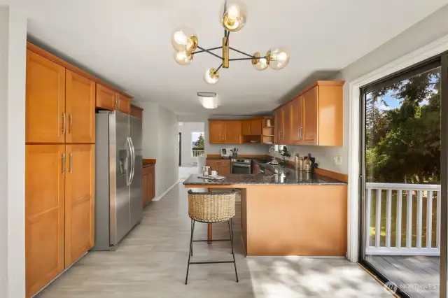 Plenty of cabinets for storage & eating space