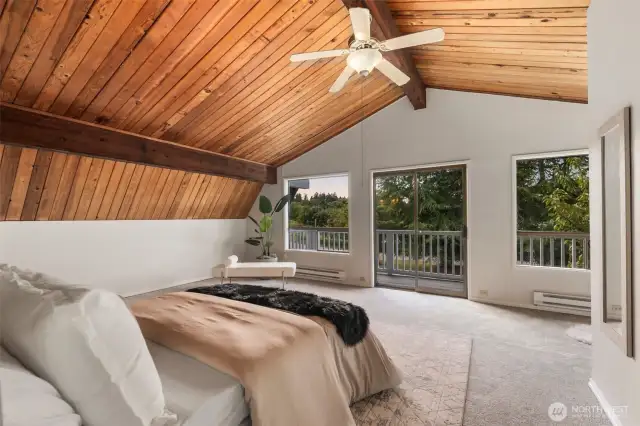 Upper floor, primary Bedroom overlooking private blacony