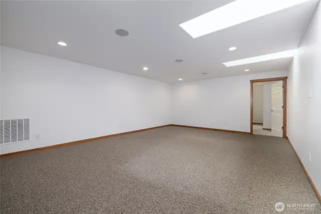 Upstairs bonus room with skylights