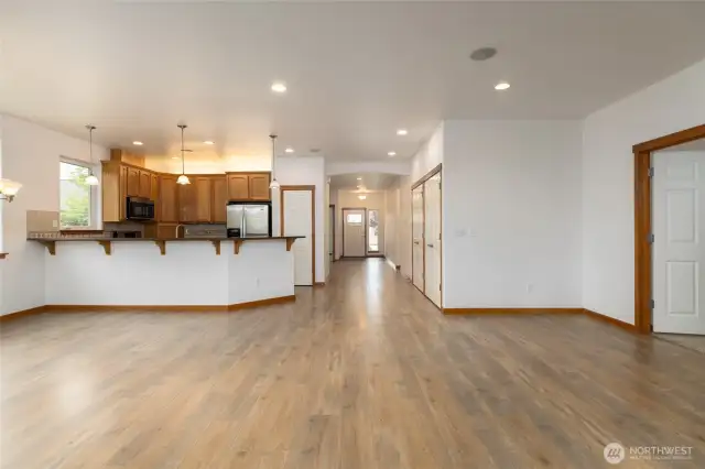 from living room looking towards entry and kitchen