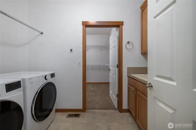 Laundry Room  with utility sink and storage