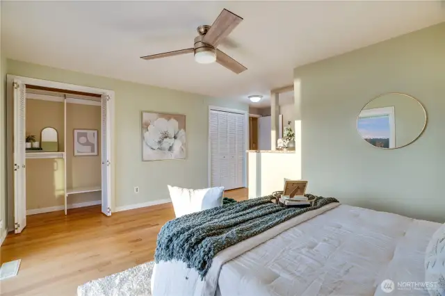 Dual closets in this suite as well as linen storage.