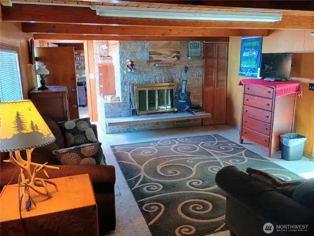 Large family room with adjacent 3/4 bath. This could make a great studio apartment