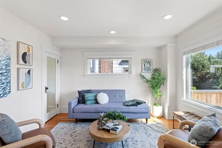 521: Main level, Informal living room with pocket french doors