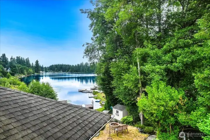 View of the lake out the primary bedroom window