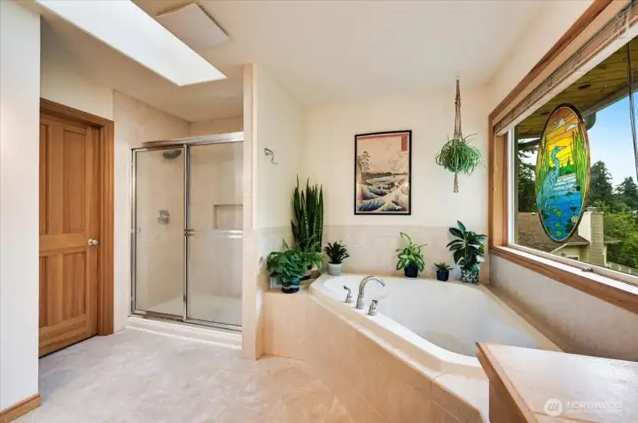 Soaking tub with view of the lake