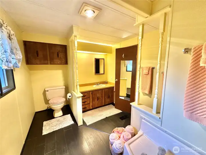 Primary bathroom with all new lamiate flooring