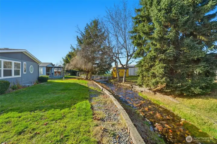 Stream provides serene Setting and natural barrier