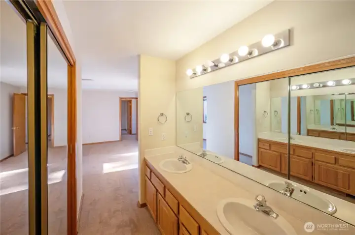 Primary bathroom with additional closet