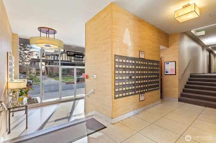 A secure, well-kept entry with an organized mail center—daily life, made easier.