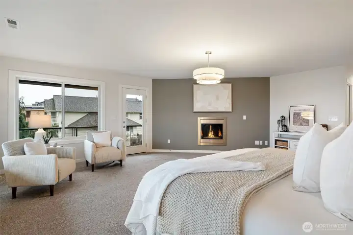 The primary suite features a gas fireplace, perfect for cozy evenings.