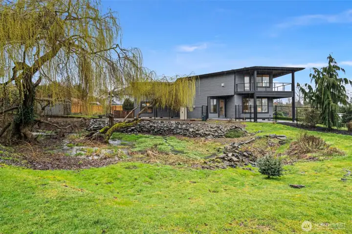 .45 acre lot that will feel like living in your own private park.