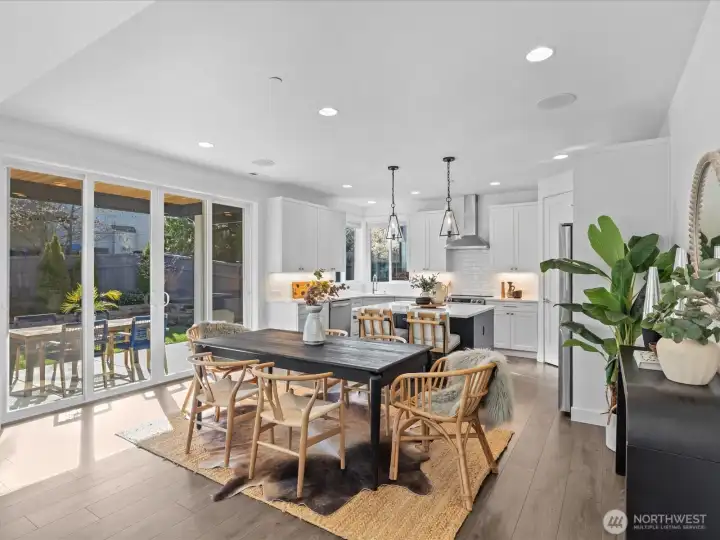 Generous dining room opens to the covered patio