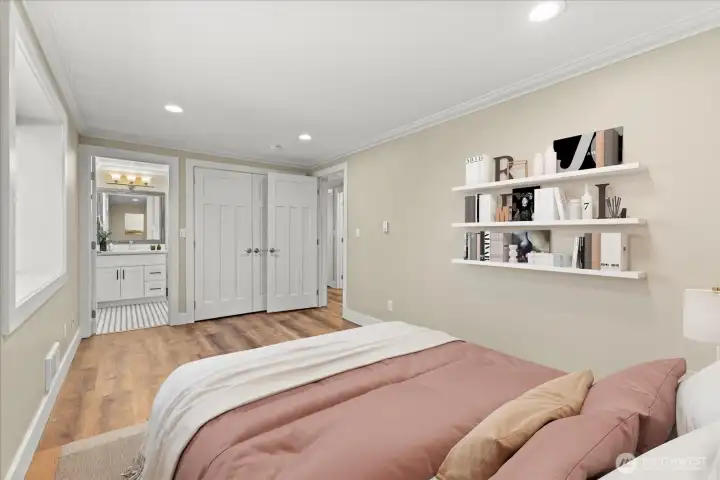 Lower level apartment bedroom with en-suite bathroom
