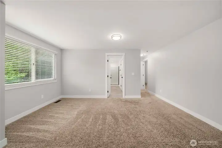 Doorway to bonus storage, walk in closet and bathroom