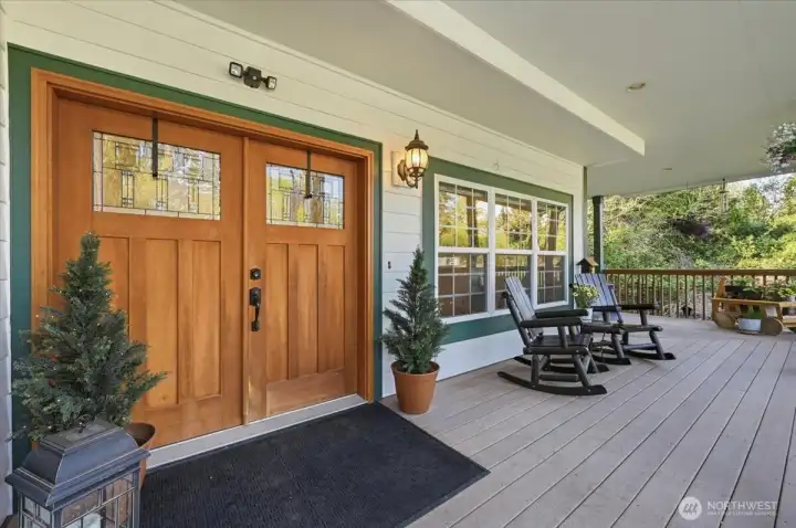 Look at this covered front porch entry! You can enjoy Mt.Rainier peeking through the trees from here!