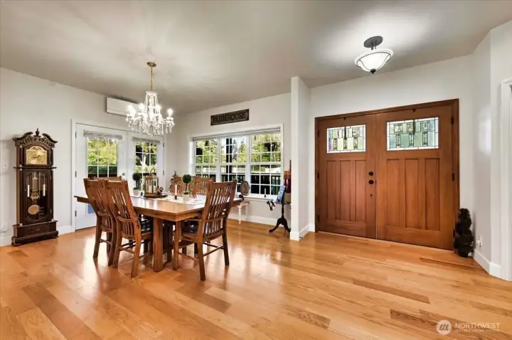 Gleaming plank hardwood floor greet you to this inviting entry and dining room~