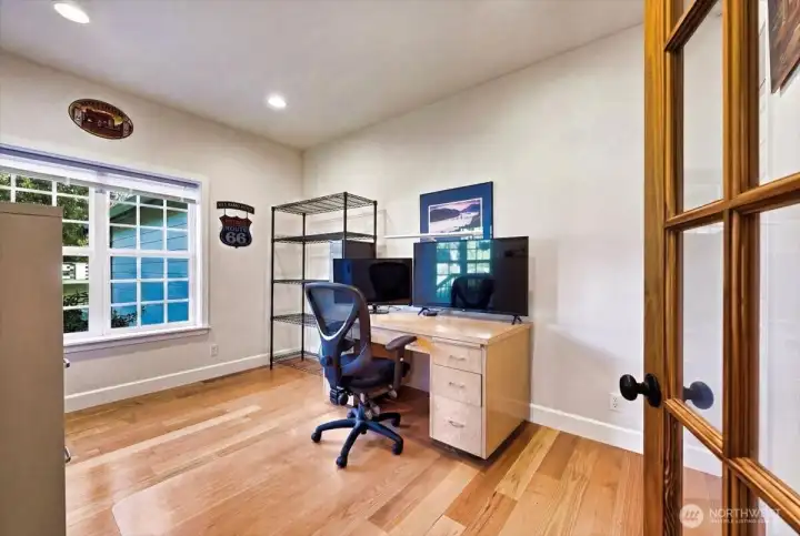 Main floor office has its own door to a 3/4 bath that is also off the entry foyer~nice!