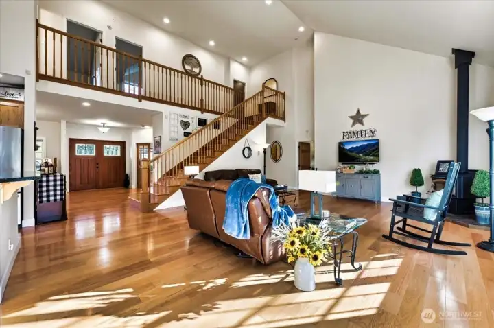 Beautiful and open living room is so inviting and has ample room to socialize!