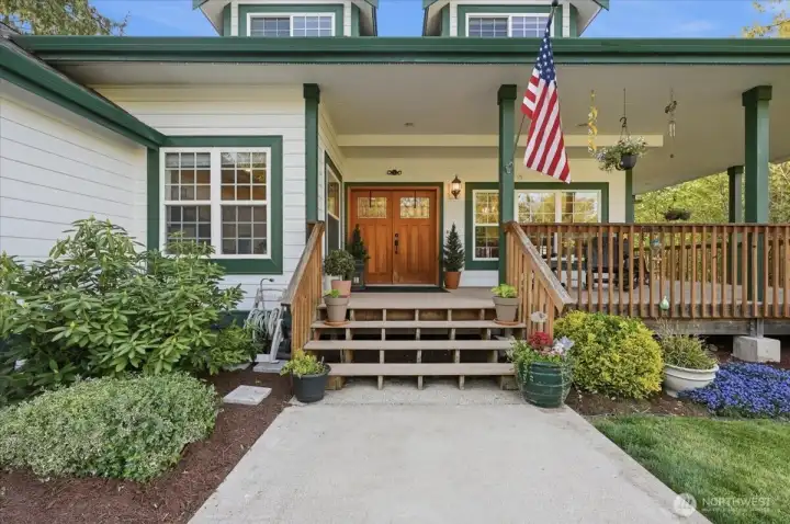 Look at this wraparound covered front porch!