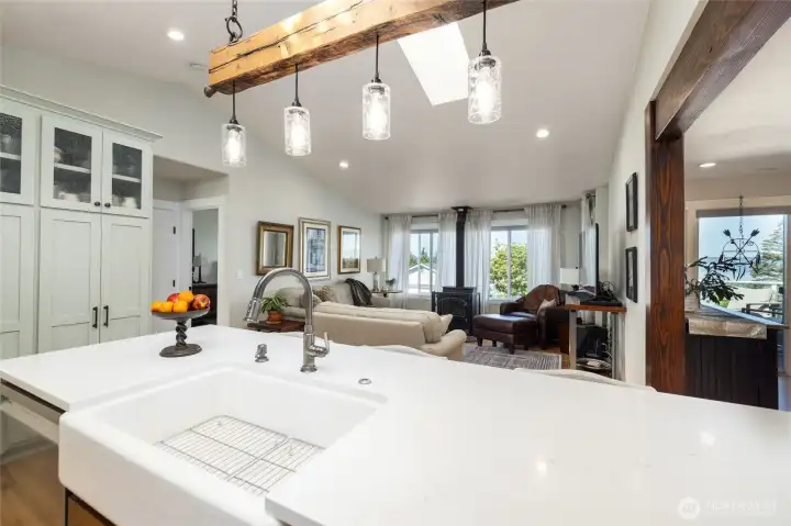 The cozy and inviting family room is open to the kitchen, so that everyone feels connected.