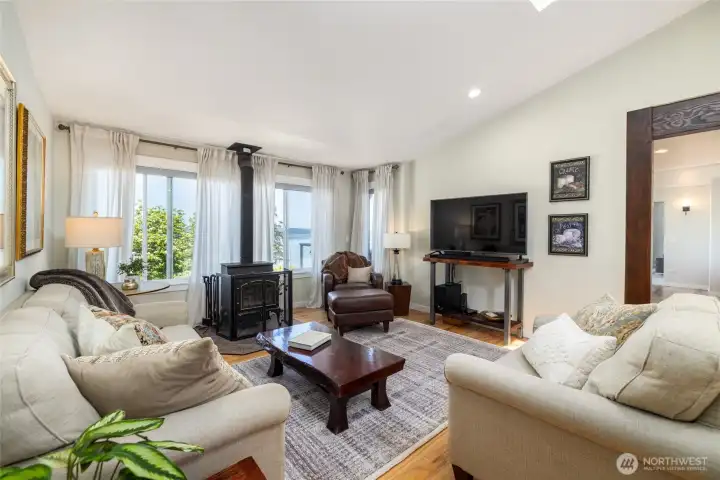 Those spectacular water views are also on display from the family room, where a fireplace makes even chilly winter days comfortable.