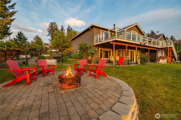 The backyard is perfectly landscaped and maintained, with a sizable garden that provides all the produce you'll need for farm-to-table dining from spring through fall.  Raspberry bushes produce all summer.