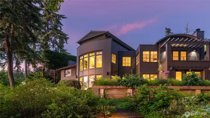 This photo is the view-side of the house at sunset. So stately. This photo is the view-side of the house at sunset. So stately.