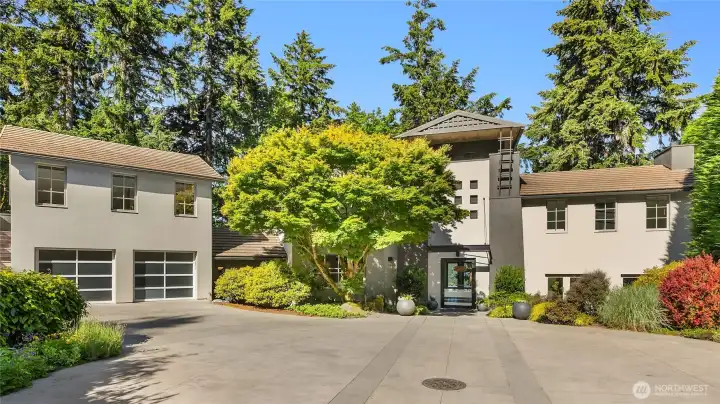 The front entry of this extraordinary home on a sunny pretty day! The front entry of this extraordinary home on a sunny pretty day!