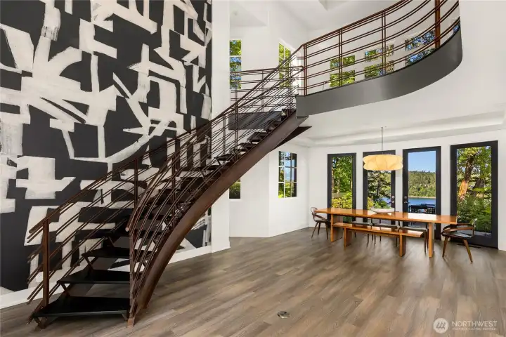 The staircase is a piece art to itself... and leads to Primary and 2 additional bedrooms. The staircase is a piece art to itself... and leads to Primary and 2 additional bedrooms.