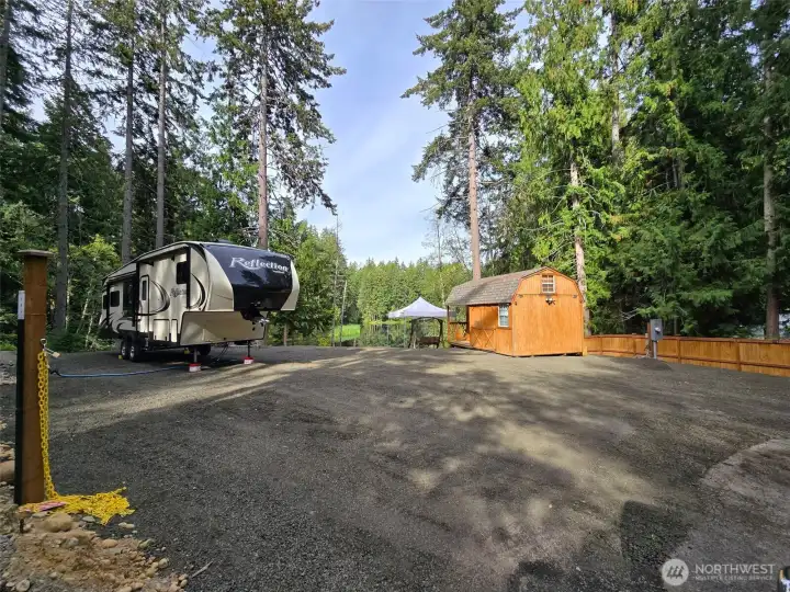 Water and power hook up at trailer and one behind shed. Trailer not included but will consider selling. Lake beyond shed Water and power hook up at trailer and one behind shed. Trailer not included but will consider selling. Lake beyond shed