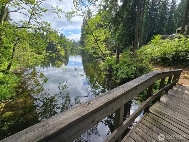 View of walking trail and lot on the right, and view of Blue Lake. View of walking trail and lot on the right, and view of Blue Lake.