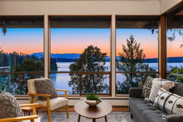 Ever-changing views of Puget Sound, Manzanita Bay, and the rugged Olympic Mountains accented by stunning sunsets