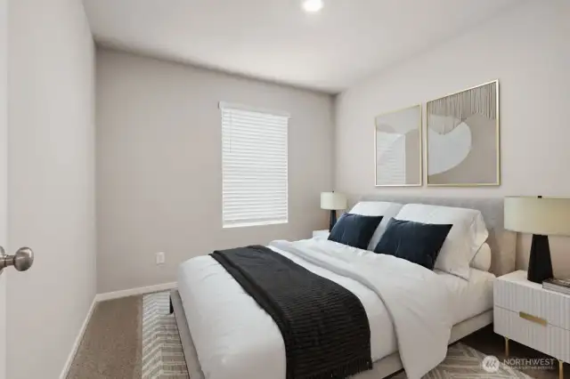 Guest Bedroom. Photos not of actual home. This is the same plan virtually staged. Plan, Colors, and options package may vary on actual home.