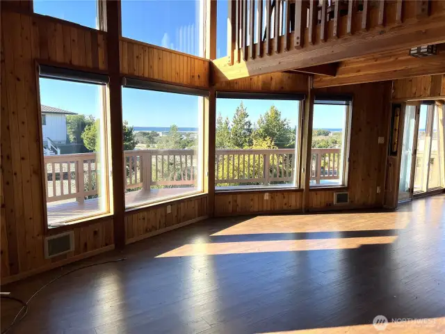 Spacious Living Room with remote window shades.