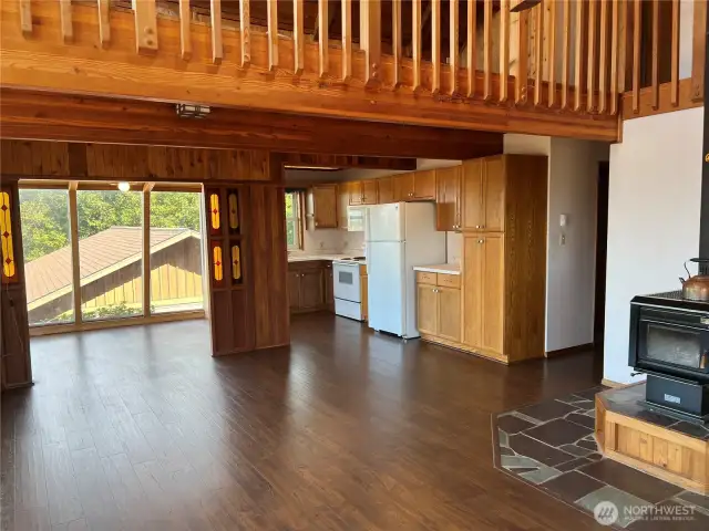 Wood laminate floors installed in 2017 throughout the common areas on the main floor. Dining and kitchen share the same space.