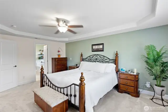 Primary Suite with Coffered Ceiling and Fan