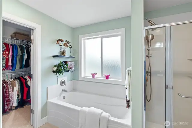 Primary Bathroom comes with a large soaking tub and separate shower