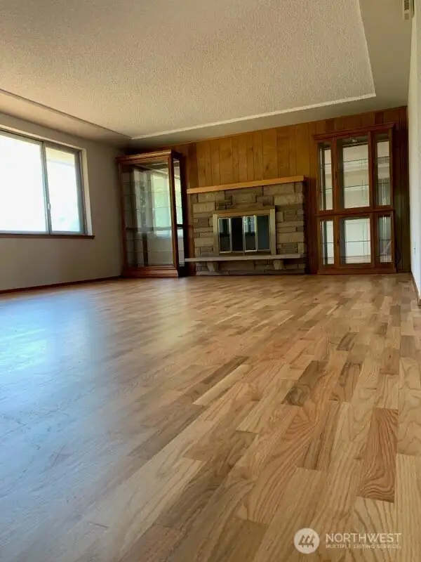 Large living room with tray ceiling