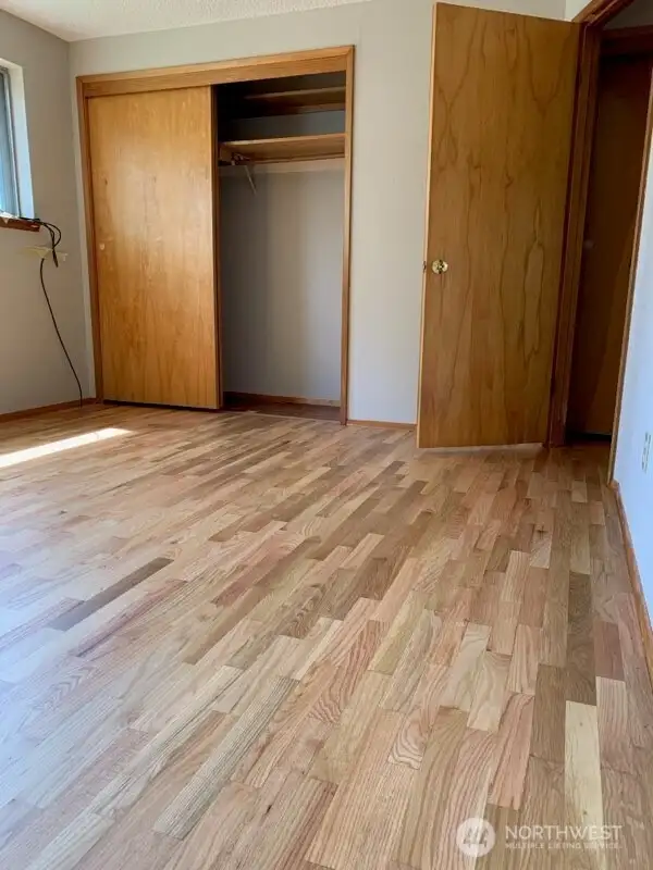 Primary bedroom with double closet