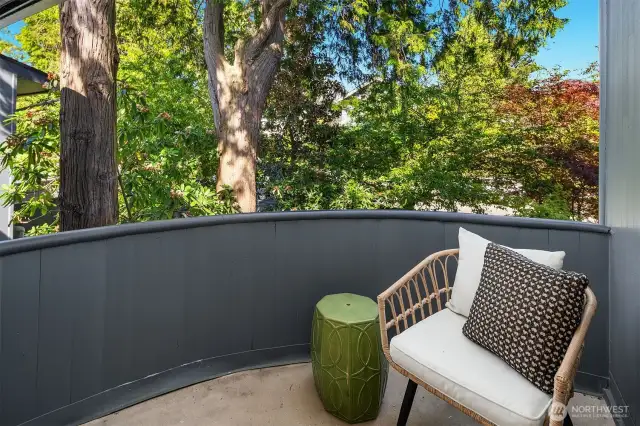 Grab a cup of coffee and enjoy solitude and tree breezes from private bedroom balcony