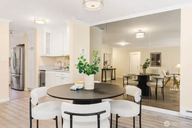 Mirrored wall adds a touch elegance to the dining area seating