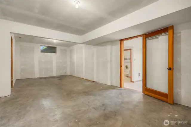 Unfinished space downstairs - so much potential to renovate how you wish!