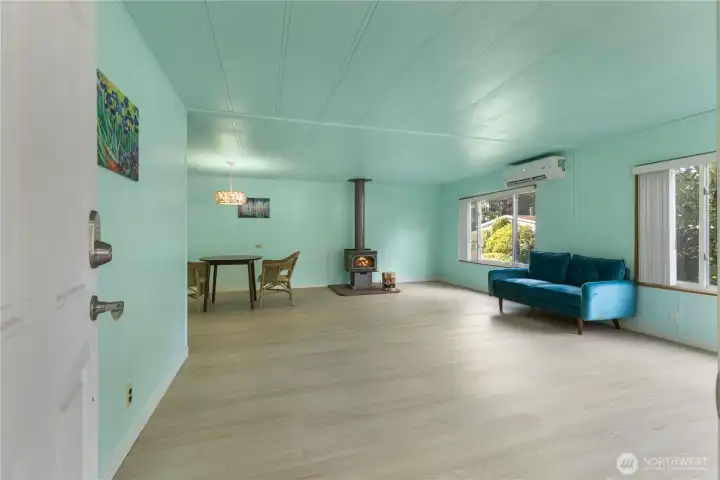 The home has an attractive wood burning fireplace. There is a mini split for heating and also to keep you cool in the summer